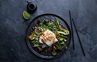 Norwegian cod with asian flavored greens