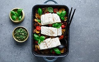 Baked Norwegian saithe in salsa verde