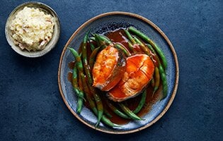 Norwegian saithe in tomato and red pepper sauce