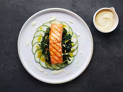 Grilled Norwegian salmon with kale and lemon hollandaise