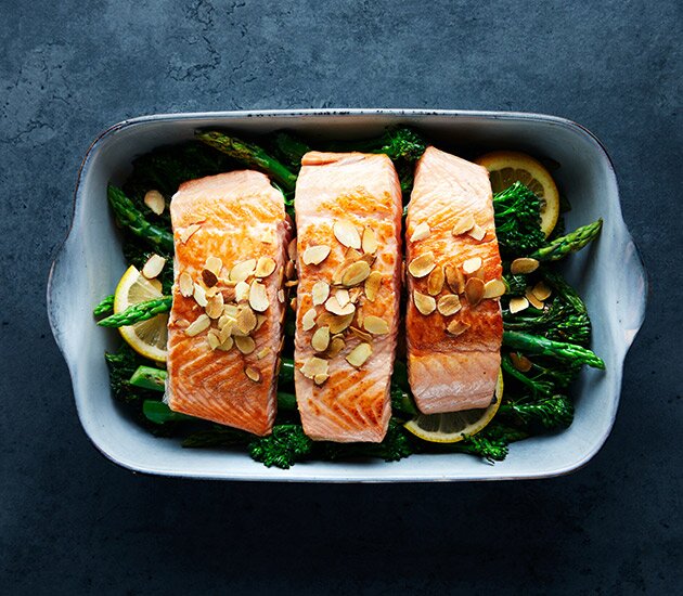 Baked salmon with broccolini and almonds