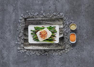 Norwegian Skrei on a bed of asparagus | Seafood from Norway