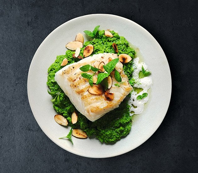 Grilled Skrei with Pea Purée, Mint Oil and Almond Foam