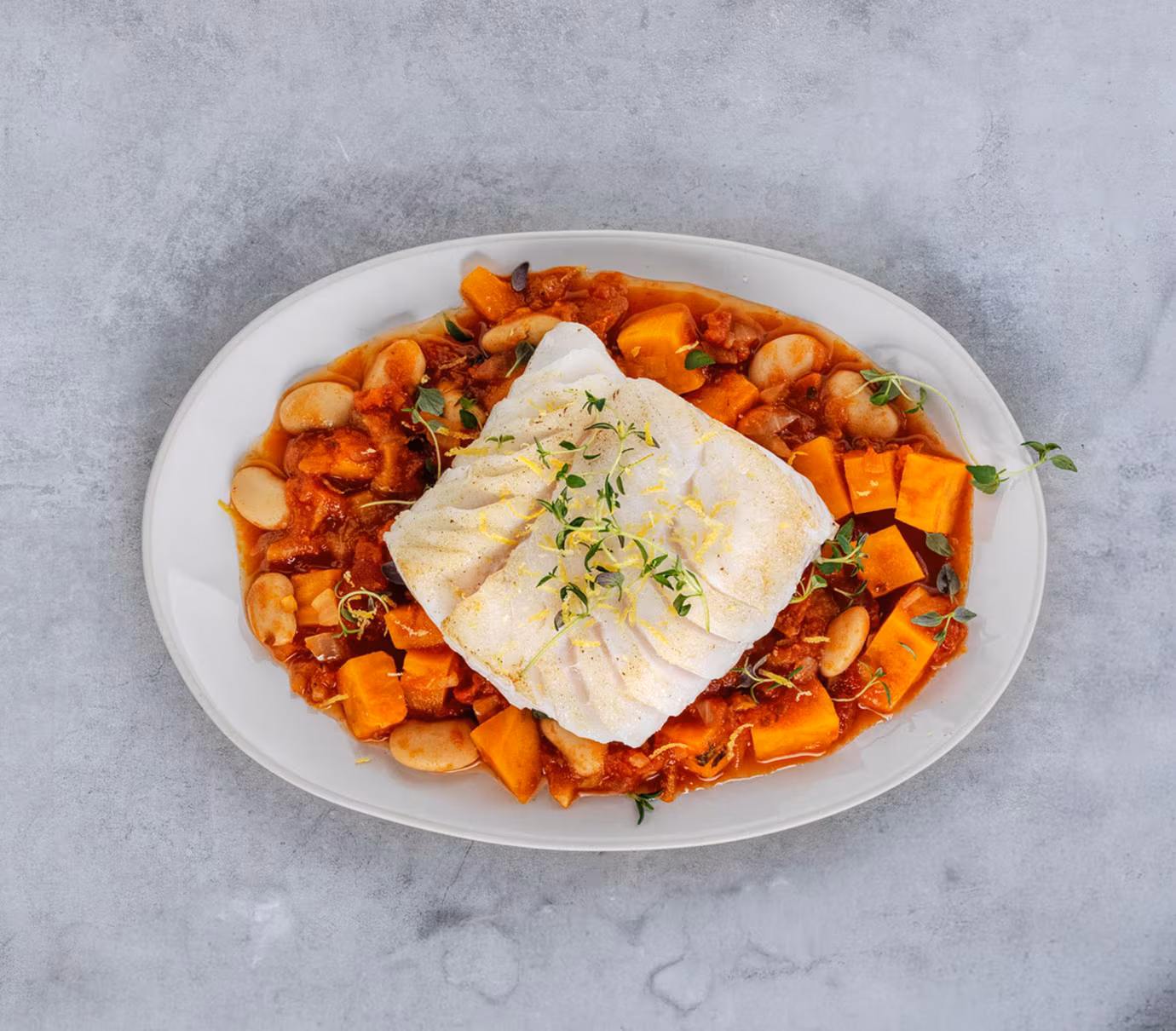 Skrei sautéed with beans, sweet potato and thyme